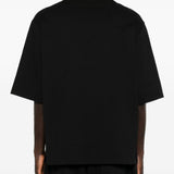 Polo con applicazioni di fiori in nero Simone rocha - uomo 