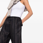 Pantaloni con stampa monogramma in nero - TOTEME  - donna 