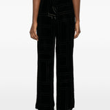 Pantaloni da pigiama monogram devoré in nero Toteme - donna 