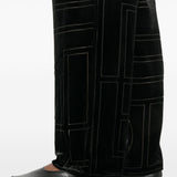 Pantaloni da pigiama monogram devoré in nero Toteme - donna 