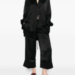 Pantaloni satinati con coulisse in nero Toteme - donna 