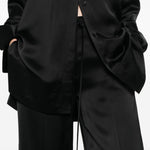 Pantaloni satinati con coulisse in nero Toteme - donna 