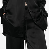 Pantaloni satinati con coulisse in nero Toteme - donna 
