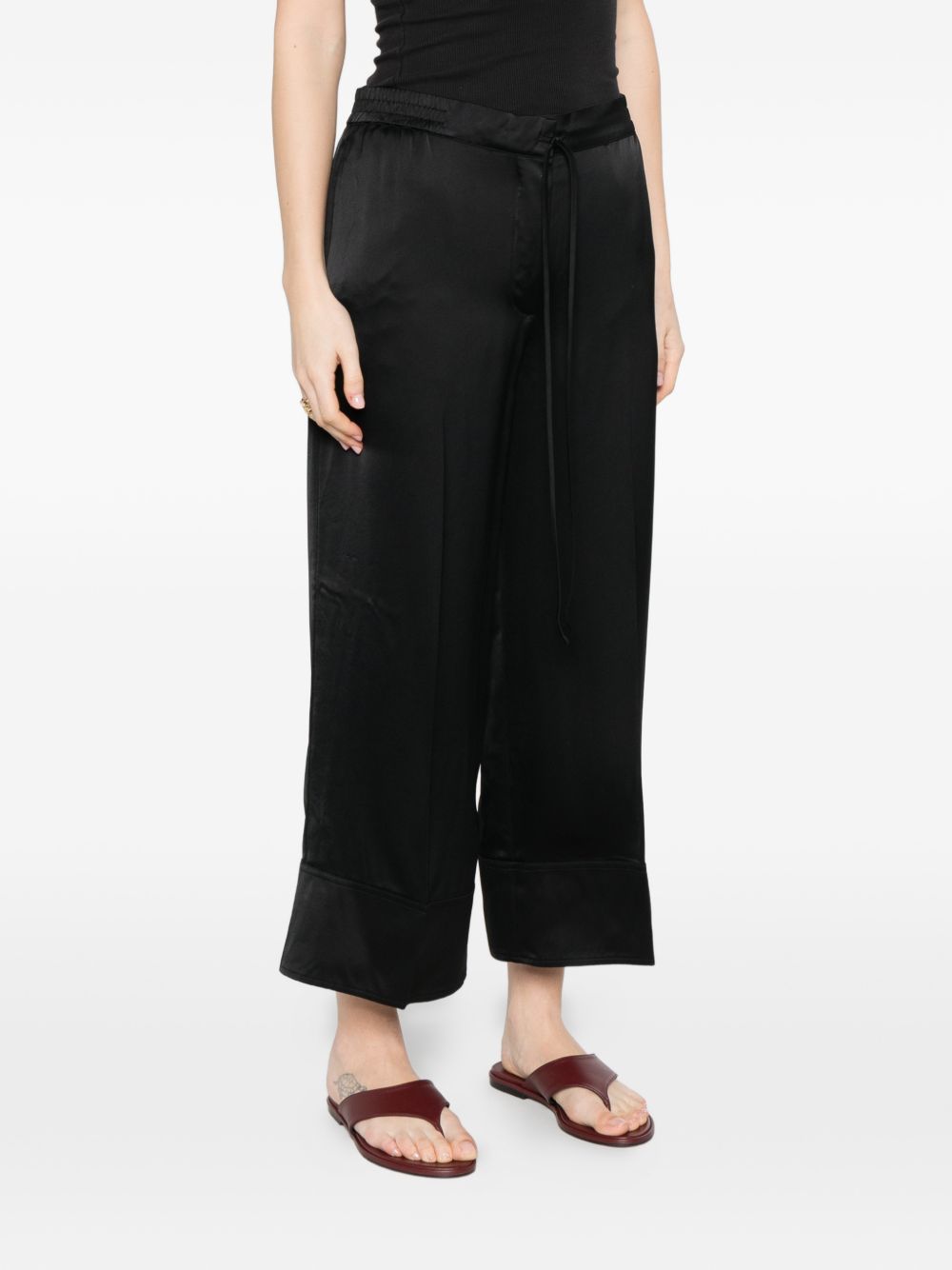 Pantaloni satinati con coulisse in nero Toteme - donna 