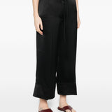 Pantaloni satinati con coulisse in nero Toteme - donna 
