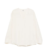 Blusa con scollo a V in avorio 