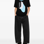 T-shirt con stampa grafica in nero Undercover - uomo 