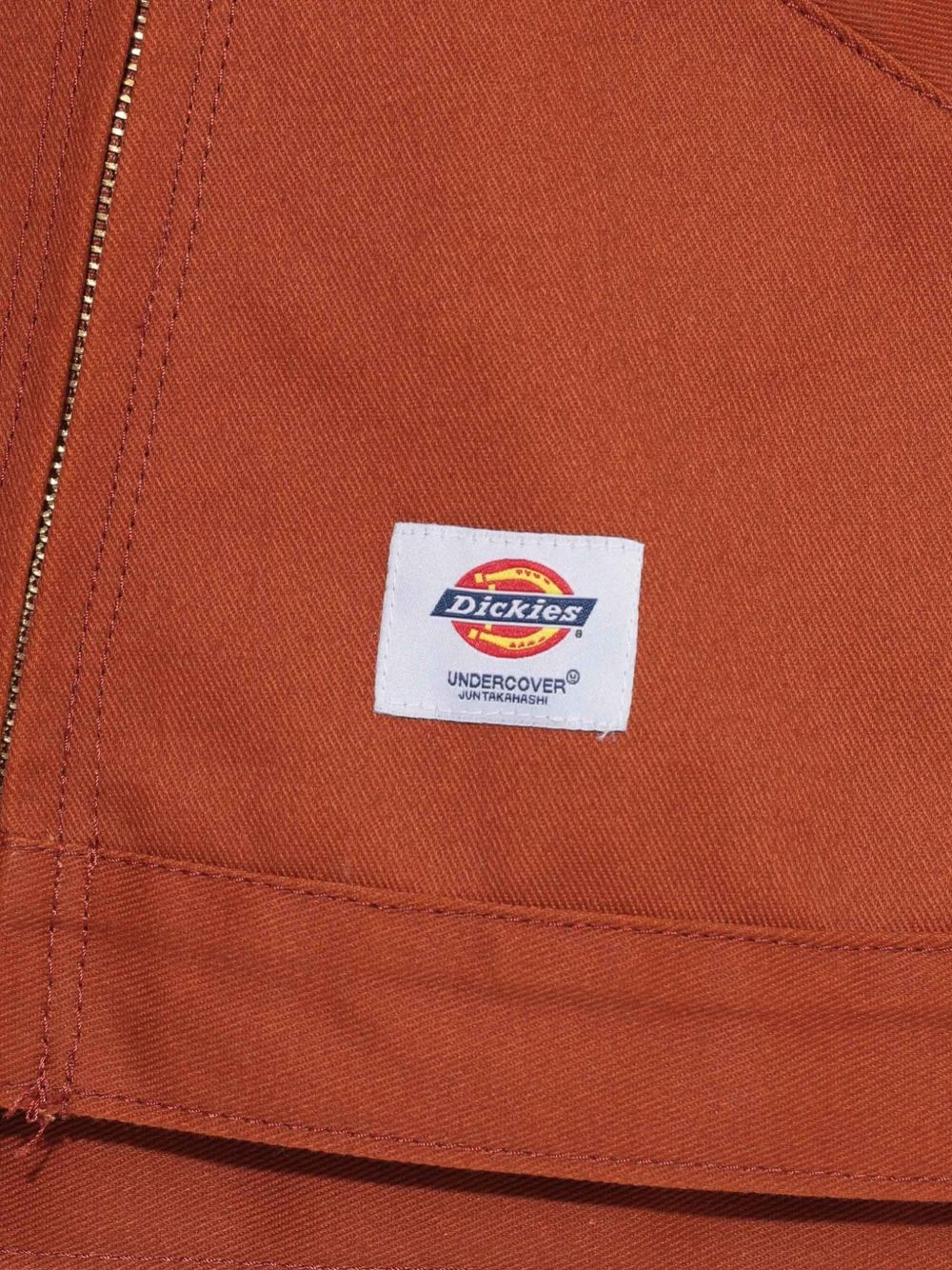 Giacca con zip in arancione Undercover - uomo 