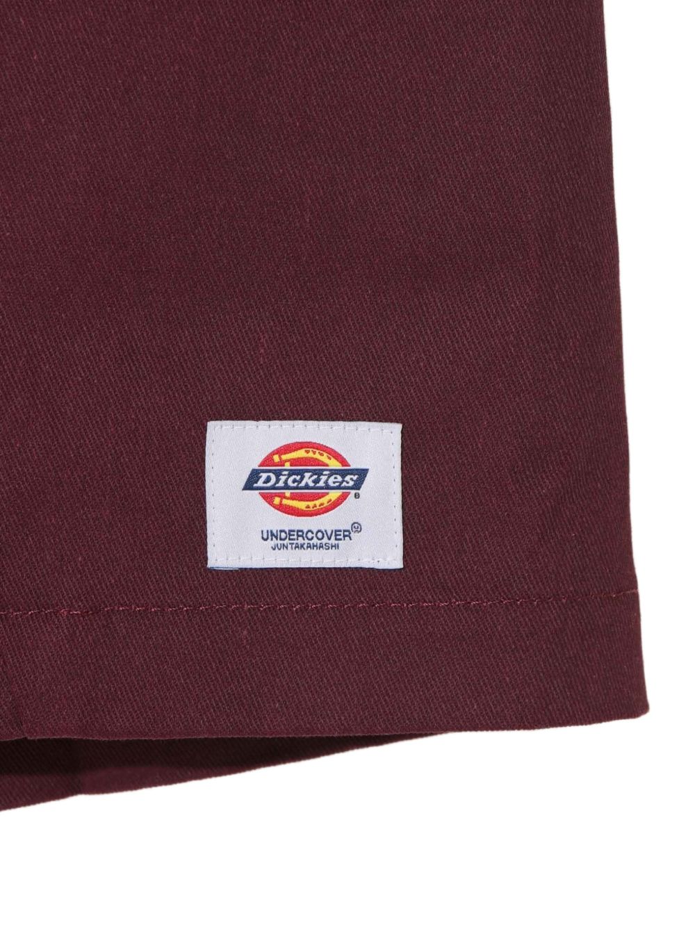 Shorts con logo in bordeaux Undercover - uomo 