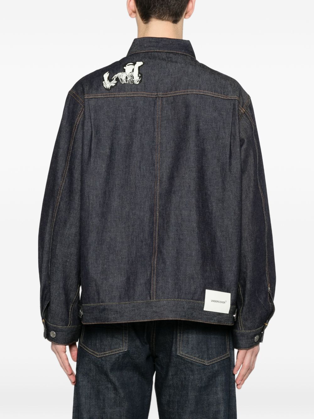 Giacca denim con stampa grafica in blu Undercover - uomo 