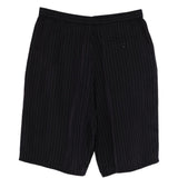 Shorts con fantasia gessata in nero Undercover - uomo 