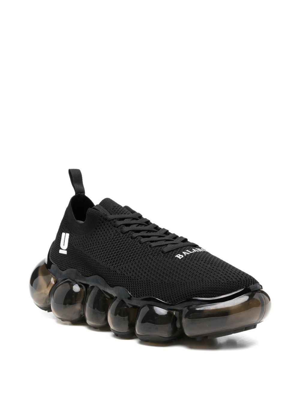Sneakers con suola a bolle in nero Undercover - uomo 