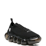 Sneakers con suola a bolle in nero Undercover - uomo 