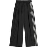 Pantaloni ampi con logo in nero Y-3 - uomo 