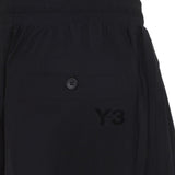 Pantaloni con tasche in nero Y-3 - uomo 