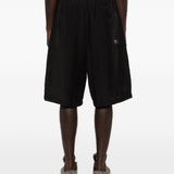 Pantaloncini con coulisse e pieghe in neroY-3 - uomo 