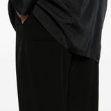 Pantaloni con bottoni in nero Yohji yamamoto - uomo 