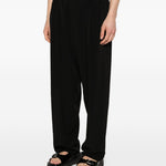 Pantaloni con pieghe frontali in nero Yohji yamamoto - uomo 