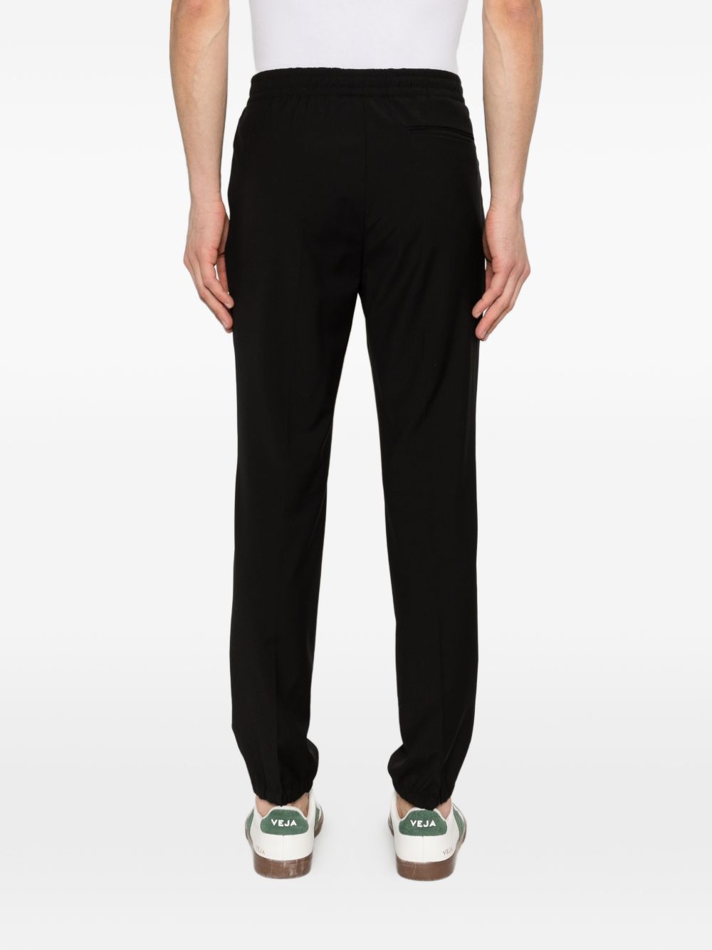 Pantaloni con chiusura nascosta in nero Zegna - uomo 