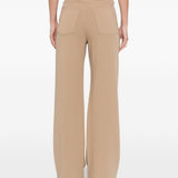 Pantaloni brioso in beige 