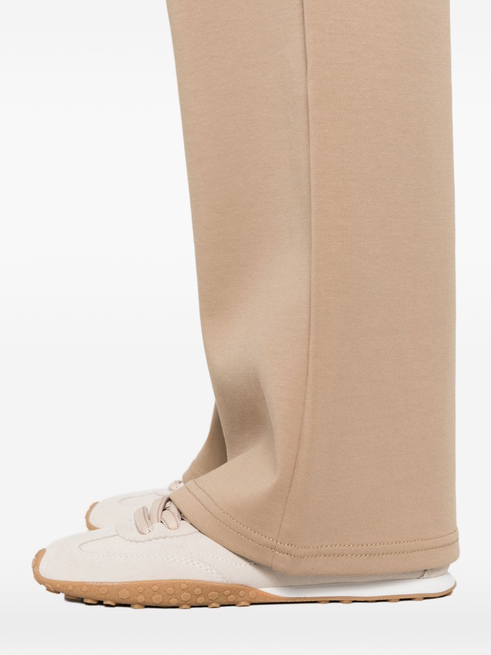 Pantaloni brioso in beige 