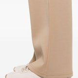 Pantaloni brioso in beige 