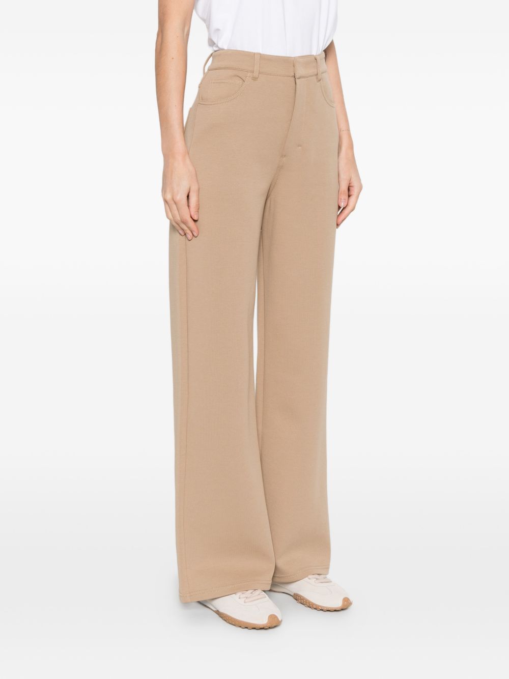 Pantaloni brioso in beige 