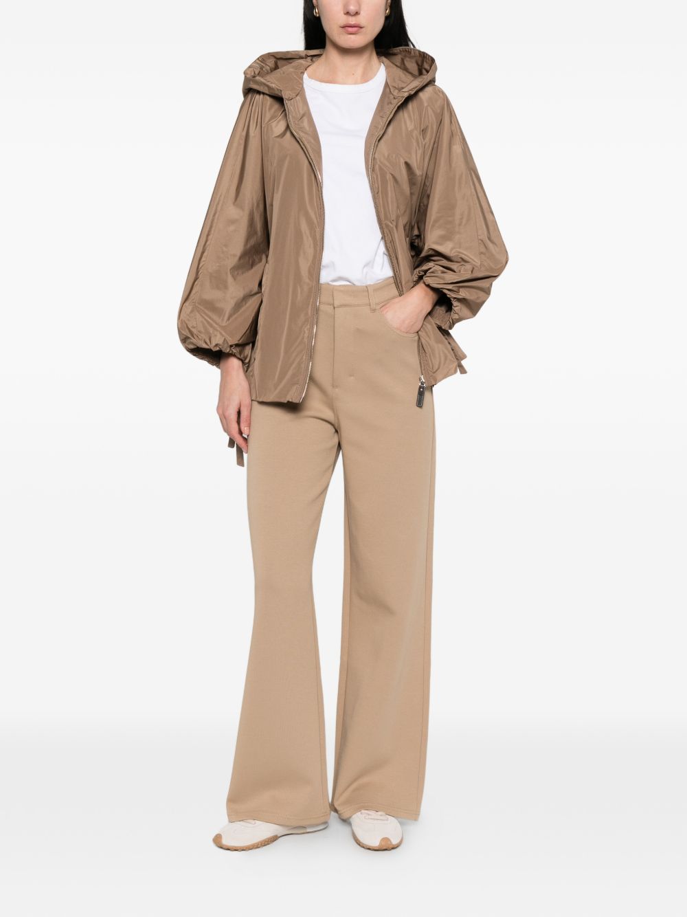 Pantaloni brioso in beige 