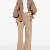 Pantaloni brioso in beige 