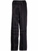 Pantaloni con stampa monogramma in nero - TOTEME  - donna