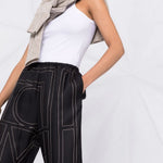Pantaloni con stampa monogramma in nero - TOTEME  - donna 