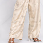 Pantaloni con stampa in beige - toteme - donna 