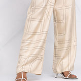 Pantaloni con stampa in beige - toteme - donna 