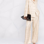 Pantaloni con stampa in beige - toteme - donna 