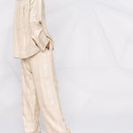 Pantaloni con stampa in beige - toteme - donna 