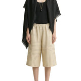 Shorts in seta con motivo monogram in beige 