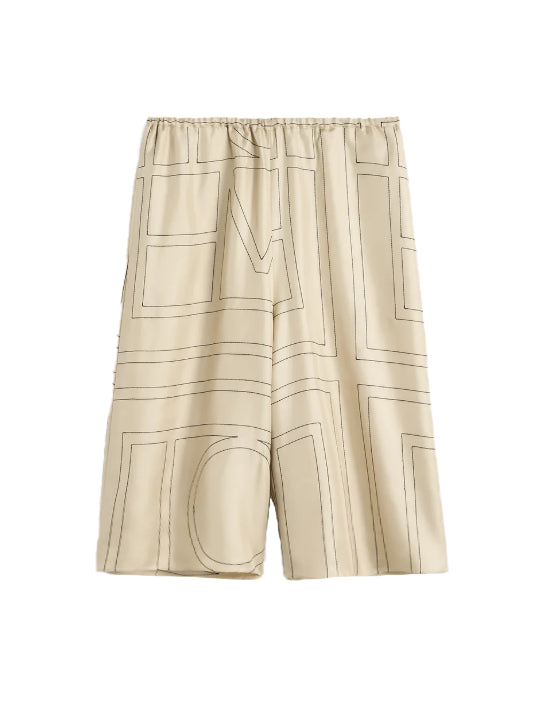 Shorts in seta con motivo monogram in beige 