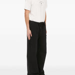 Pantaloni con applicazione in nero Mm6 maison margiela - uomo 