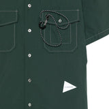 Camicia a maniche corte con moschettone in verde And wander - uomo 