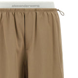 Pantaloni con cintura a doppio strato e logo in marrone Alexander wang - donna 