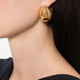 Orecchini a cerchio con logo in oro Coperni - donna 