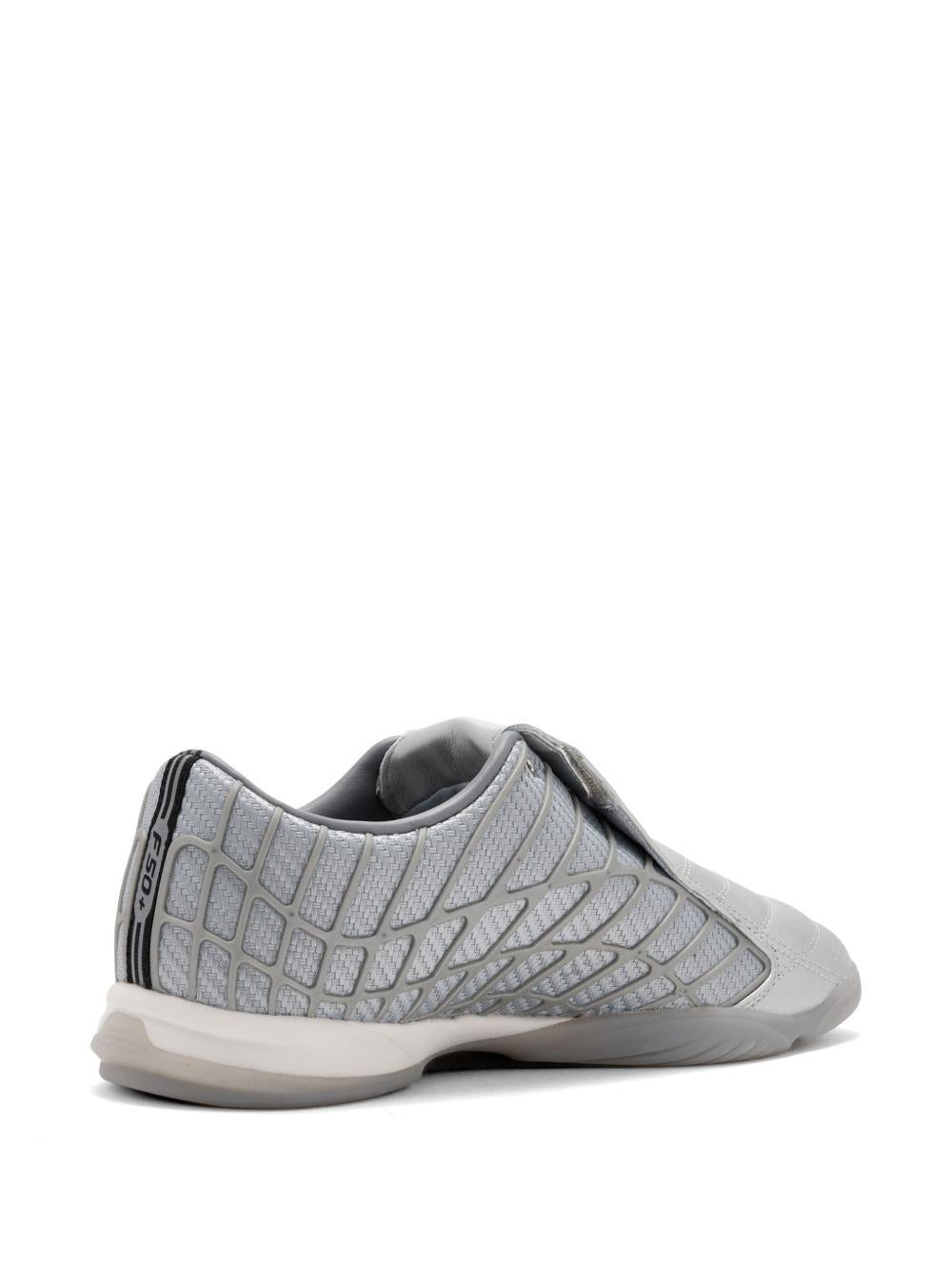 Sneakers con applicazioni f50 in grigio Adidas - unisex 