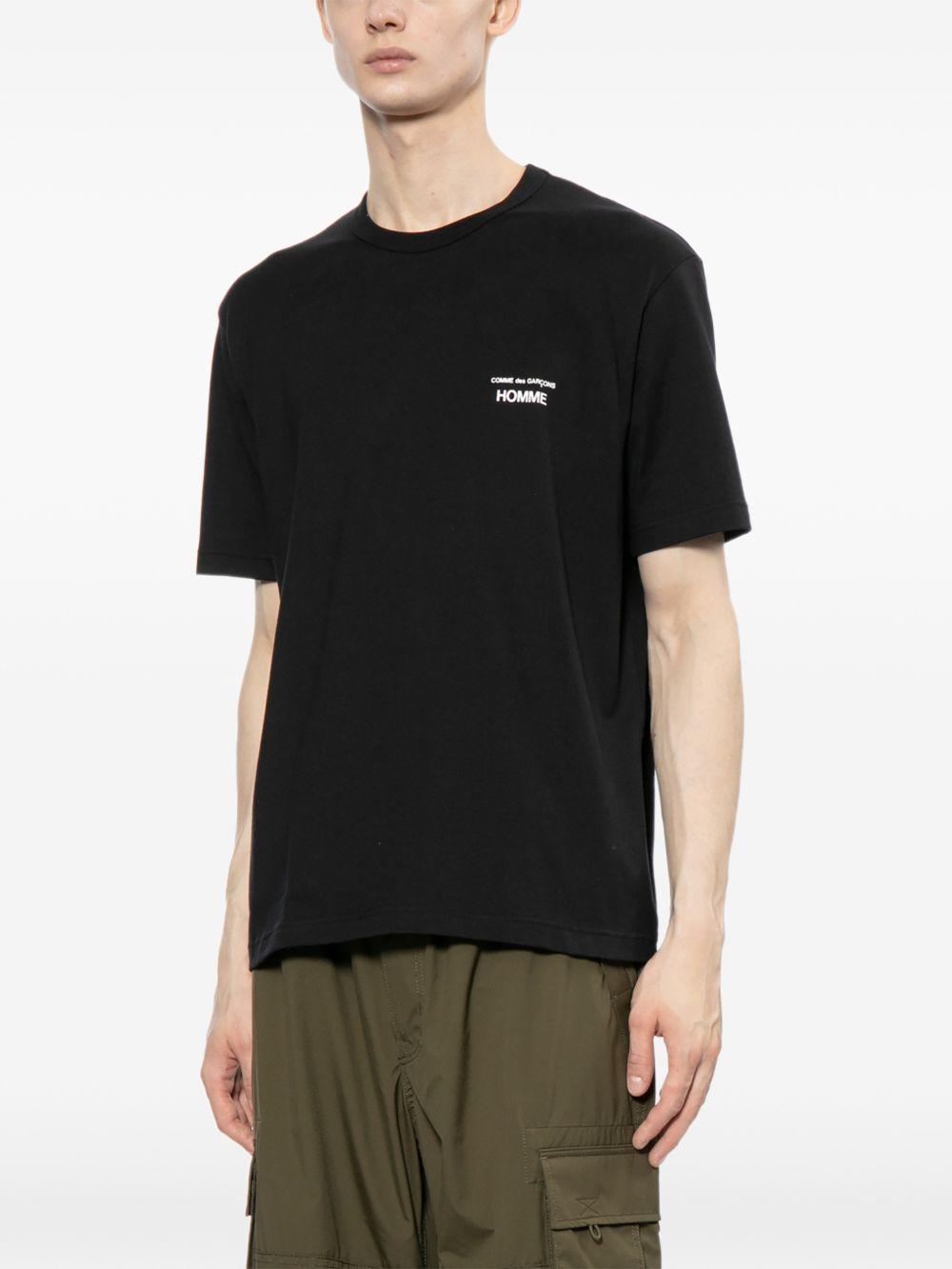 T-shirt con logo in nero Comme des garcons homme - uomo 