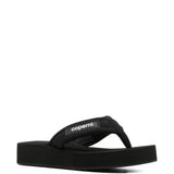 Ciabatte con logo in nero Coperni - donna 