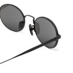 Black oval-frame sunglasses Chimi - unisex 