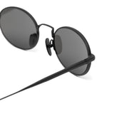 Black oval-frame sunglasses Chimi - unisex 