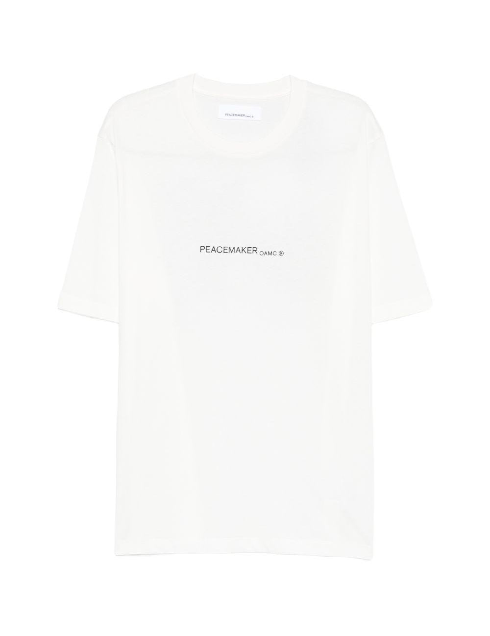 T-shirt con stampa grafica in bianco Oamc peacemaker - uomo 