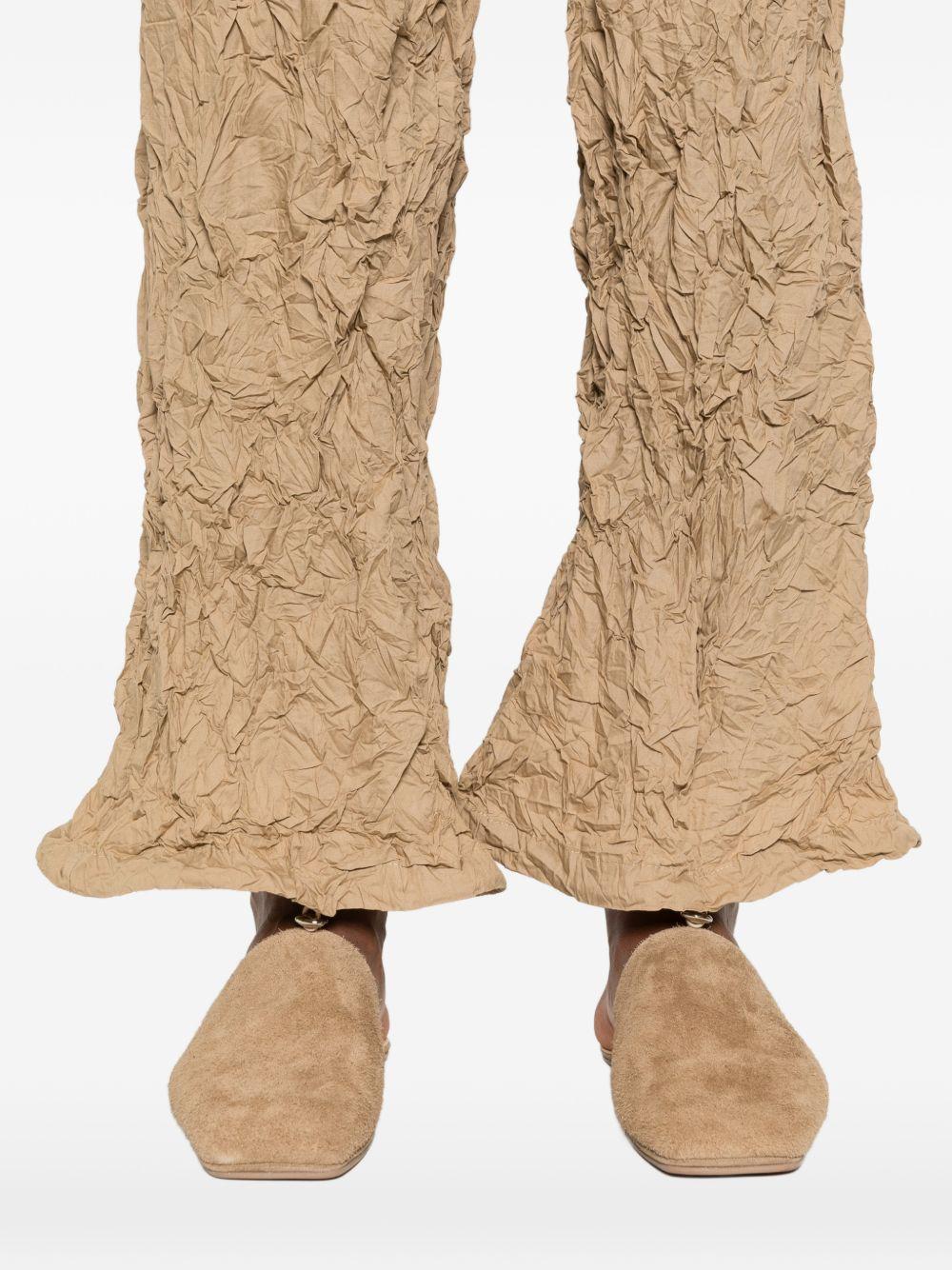 Pantaloni plissettati in beige gongdid design - donna 