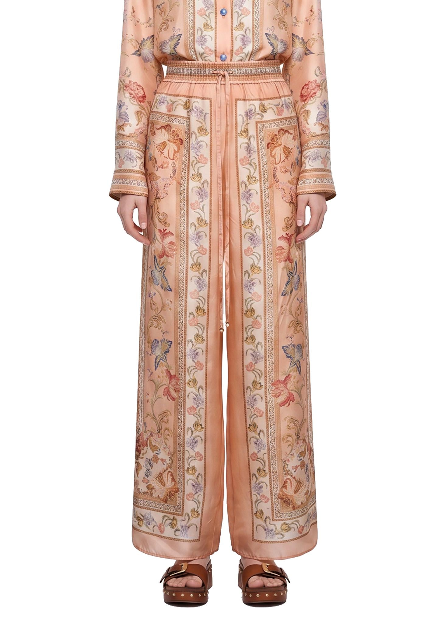 Pantaloni Roselight in seta floreale rosa 