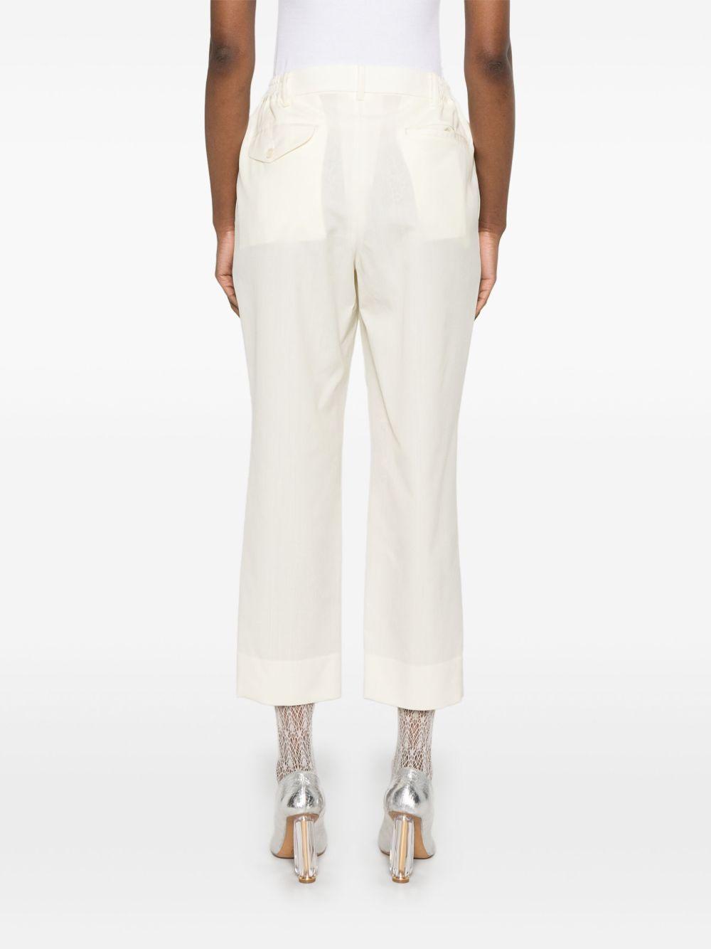 Pantaloni affusolati in bianco Comme Des Garçons - donna 